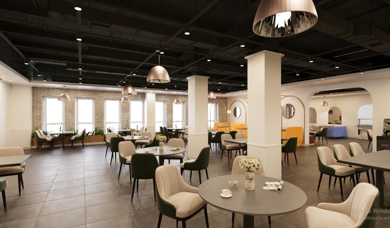 A modern, spacious dining area with round tables and padded chairs. The room features large windows, white columns, and hanging pendant lights. Decor includes small flower arrangements on tables and an arched hallway in the background.